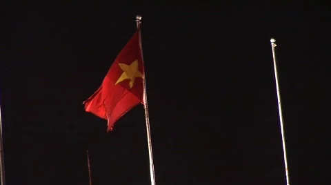 Vietnamese flag at night Stock Footage 289313