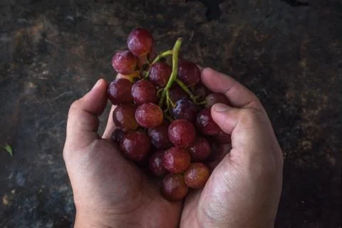 Vietnamese grape on rustic background Stock Photos