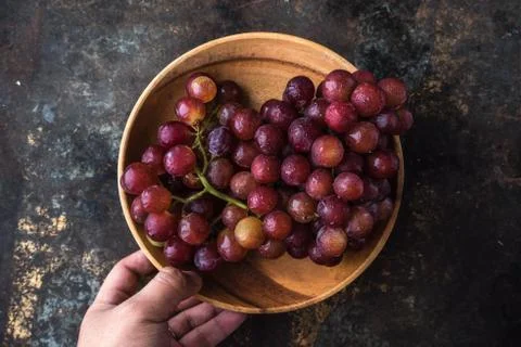 Vietnamese grape on rustic background Stock Photos