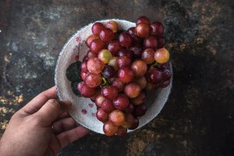Vietnamese grape on rustic background Stock Photos