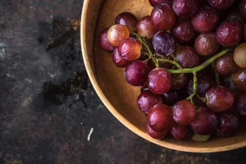 Vietnamese grape on rustic background Stock Photos