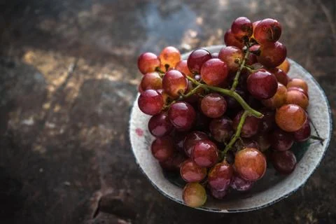 Vietnamese grape on rustic background Stock Photos