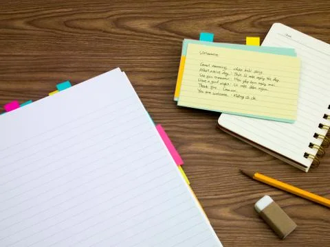 Vietnamese; Learning New Language Writing Words on the Notebook Stock Photos