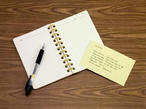 Vietnamese; Learning New Language Writing Words on the Notebook Stock Photos