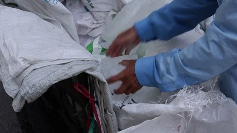 Vietnamese man stabs ice Stock Footage 119560718
