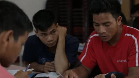 Vietnamese Men Study the Bible Together Stock Footage 37351148
