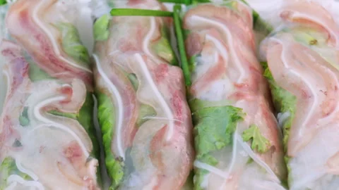 Vietnamese pork summer rolls rotating slowly Stock Footage 337360265