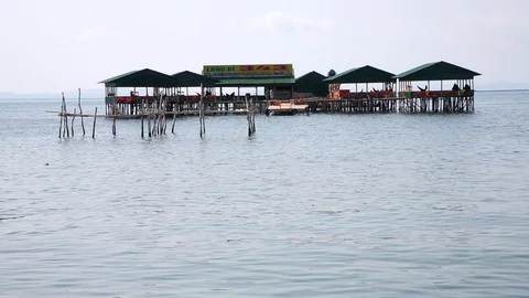 Vietnamese Restaurants on Stilts Over Water Stock Footage 88409305