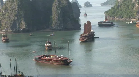 Vietnamese sail boats in bay Stock Footage