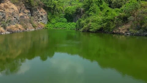 "Vietnamese Serenity: A Mesmerizing 4K Drone Journey Across Tranquil Lakes and M Stock Footage 235815577