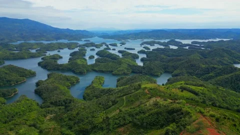 "Vietnamese Serenity: A Mesmerizing 4K Drone Journey Across Tranquil Lakes and M Stock Footage 235818451
