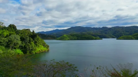"Vietnamese Serenity: A Mesmerizing 4K Drone Journey Across Tranquil Lakes and M Stock Footage 235818641