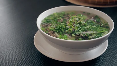 Vietnamese soup Pho Bo with chilli pepper 스톡 동영상 104018013