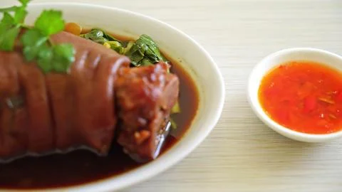 Vietnamese spring roll with dipping sauce on light table Stock Photos