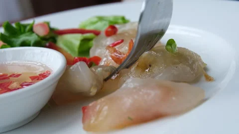 Vietnamese spring rolls nem Rice meat salad Beef Rendang and boiled egg Stock Footage 310372553