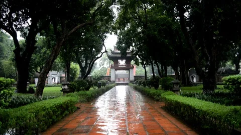 Vietnamese temple entrance while raining (Wide shot) Stock Footage 100314010
