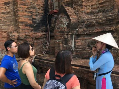Vietnamese tour guide at work Stock Photos
