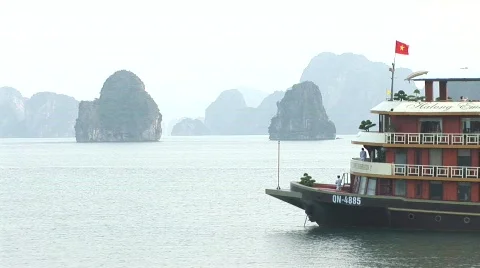 Vietnamese wooden tour boat Stock Footage