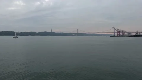 View of 25th April Bridge and Tagus river in Lisbon in December Stock Footage 226989629