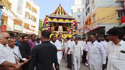 View of 98th Sri Sathya Sai Baba birthday anniversary procession. Stock Footage 292837072