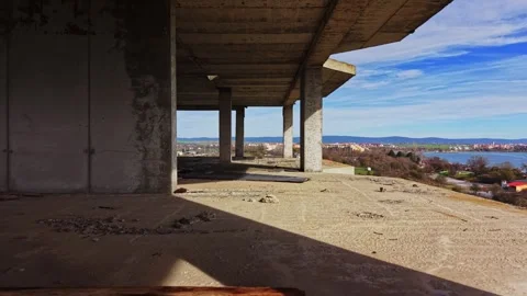 View from an abandoned building overlooking a riverside town Stock Footage 325085130