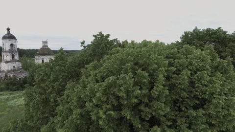 View of an abandoned old white Orthodox temple in the old village Stock Footage 338200440