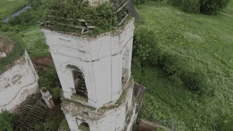 View of an abandoned old white Orthodox temple in the old village Stock Footage 338200446
