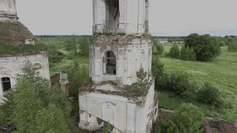 View of an abandoned old white Orthodox temple in the old village Stock Footage 338200475