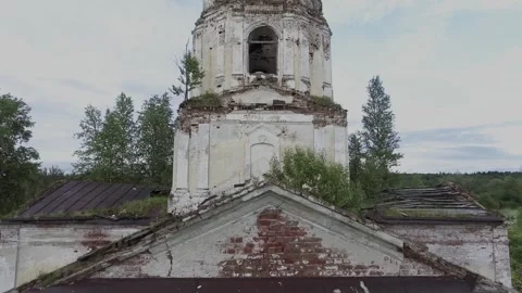 View of an abandoned old white Orthodox temple in the old village Stock Footage 338200535