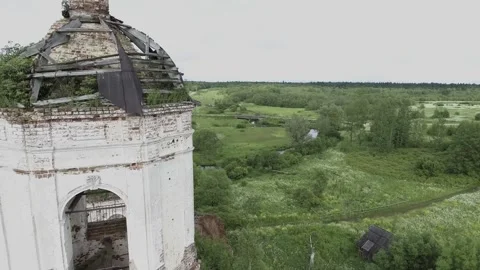 View of an abandoned old white Orthodox temple in the old village Stock Footage 338200555