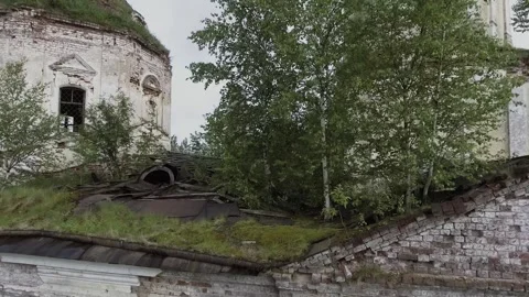 View of an abandoned old white Orthodox temple in the old village Stock Footage 338200598