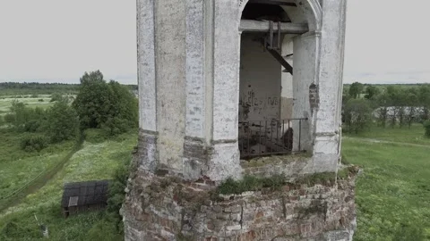 View of an abandoned old white Orthodox temple in the old village Stock Footage 338200640