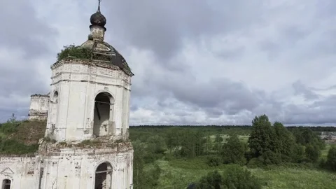 View of an abandoned old white Orthodox temple in the old village Stock Footage 338200643