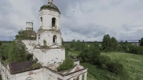 View of an abandoned old white Orthodox temple in the old village Stock Footage 338200649