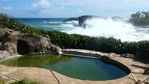 View of Abandoned Pool with Big Crashing Waves in the Background Stock Footage 218273509