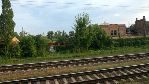 View of an abandoned station from the train window Stock Footage 114829755