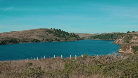 View of Abbotts Lagoon under a clear blue sky at Point Reyes Stock Footage 327256110