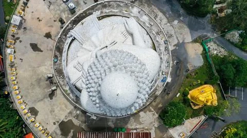 View from above of the big Buddha's head marble in Phuket Stock Photos
