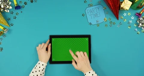 View from above on the black horizontal tablet computer lying on the blue table Video stock 89314751