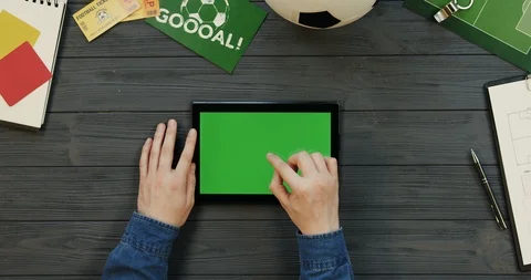 View from above on the black horizontal tablet computer on the dark grey wooden Stock Footage 96332107