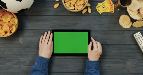 View from above on the black horizontal tablet computer on the dark grey wooden 스톡 동영상 96432689
