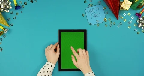View from above on the black vertical tablet computer lying on the blue table Stock Footage 89314376