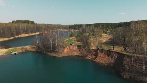 View from above on a blue lake, camera moves slowly, nature trip Stock Footage 308907809