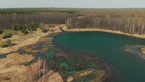 View from above on a blue lake, camera moves slowly, nature trip 動画素材 308907811