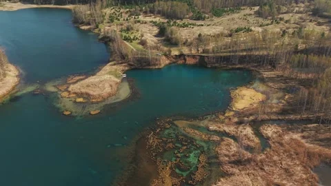 View from above on a blue lake, camera moves slowly, nature trip 動画素材 308907812