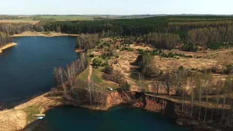 View from above on a blue lake, camera moves slowly, nature trip 動画素材 308907814