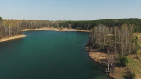 View from above on a blue lake, camera moves slowly, nature trip 動画素材 308907817