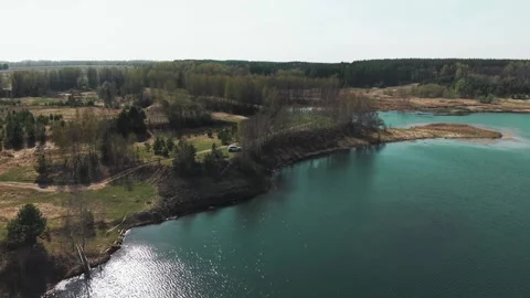 View from above on a blue lake, camera moves slowly, nature trip 動画素材 308907819