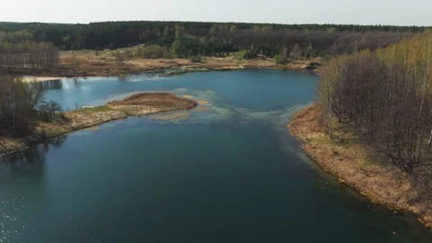 View from above on a blue lake, camera moves slowly, nature trip 動画素材 308907820