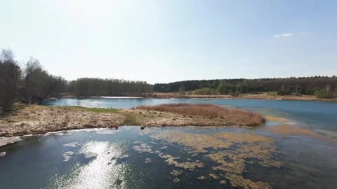 View from above on a blue lake, camera moves slowly, nature trip Stock Footage 308907822